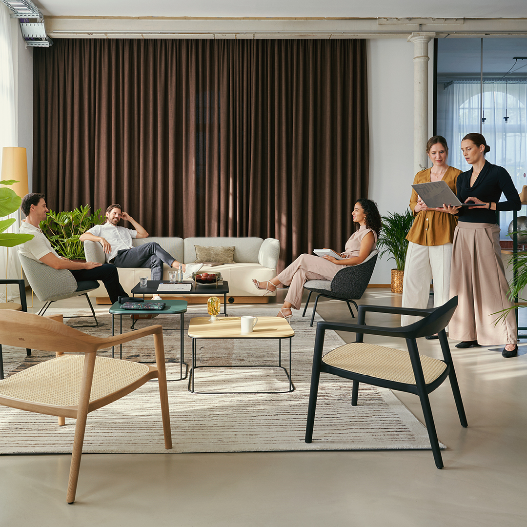 people sitting in an office club setting