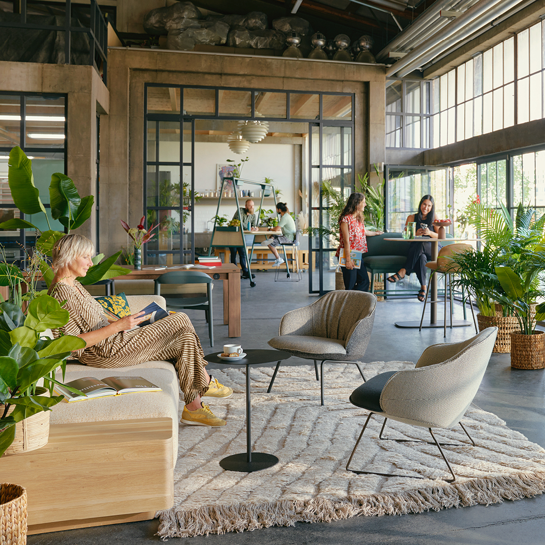 People sit in a biophilic office